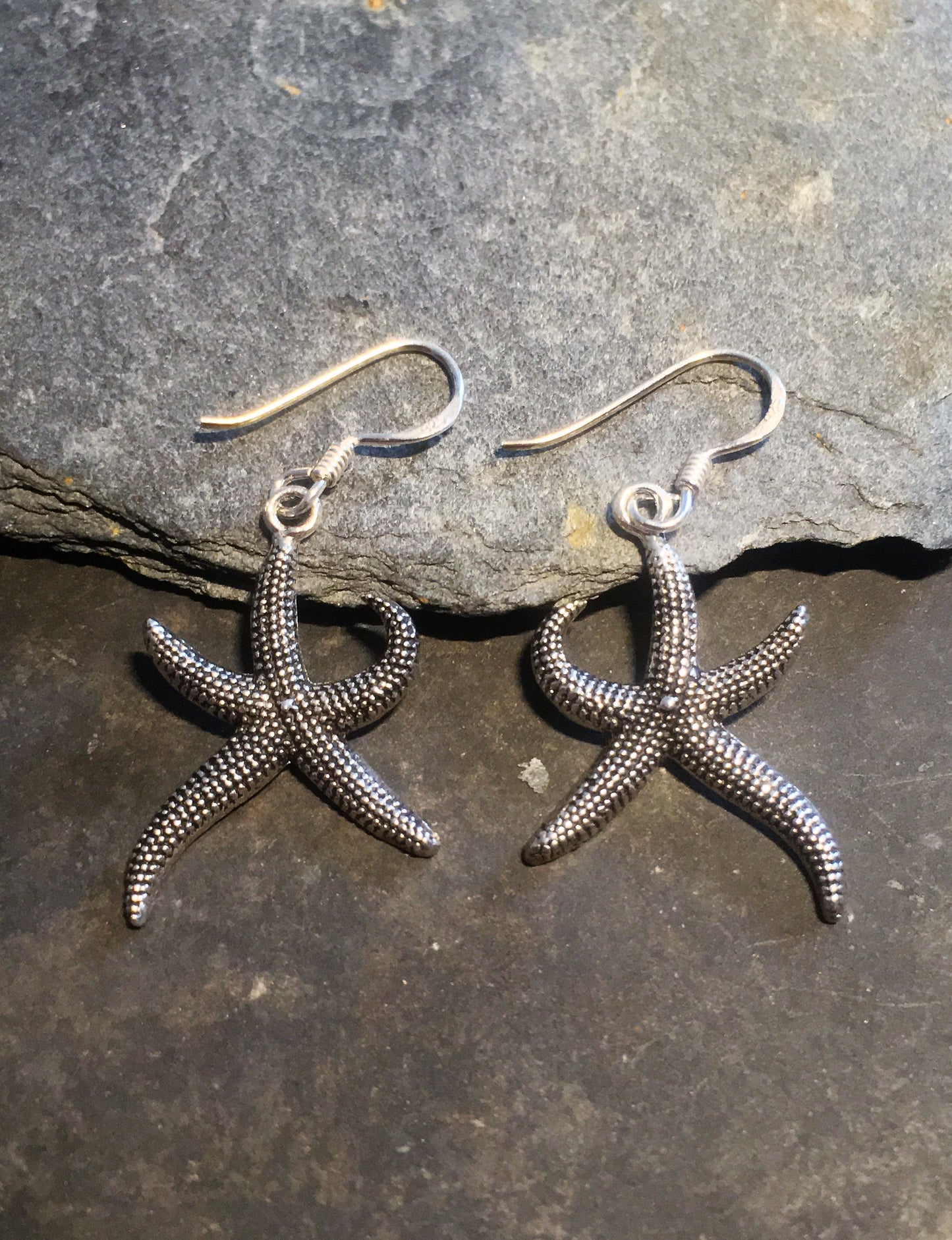E573B0 - STARFISH DROP EARRING OXIDISED