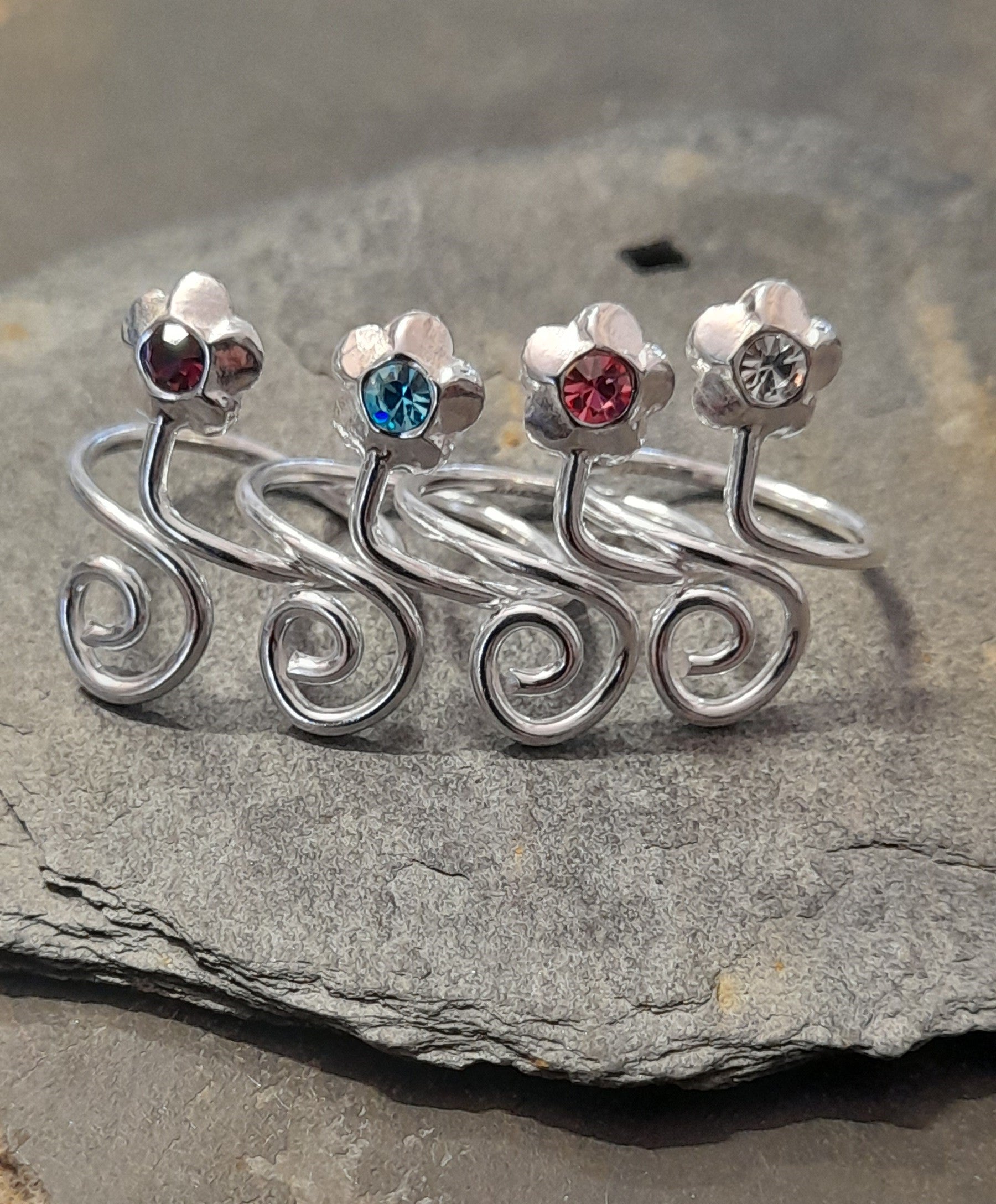 4 Ass Bl Pk Pur Cl Cubic Zirconia T/Ring Un-Boxed