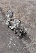 SS806B - CLEAR CZ FLOWER S/PLATE STUD 12MM