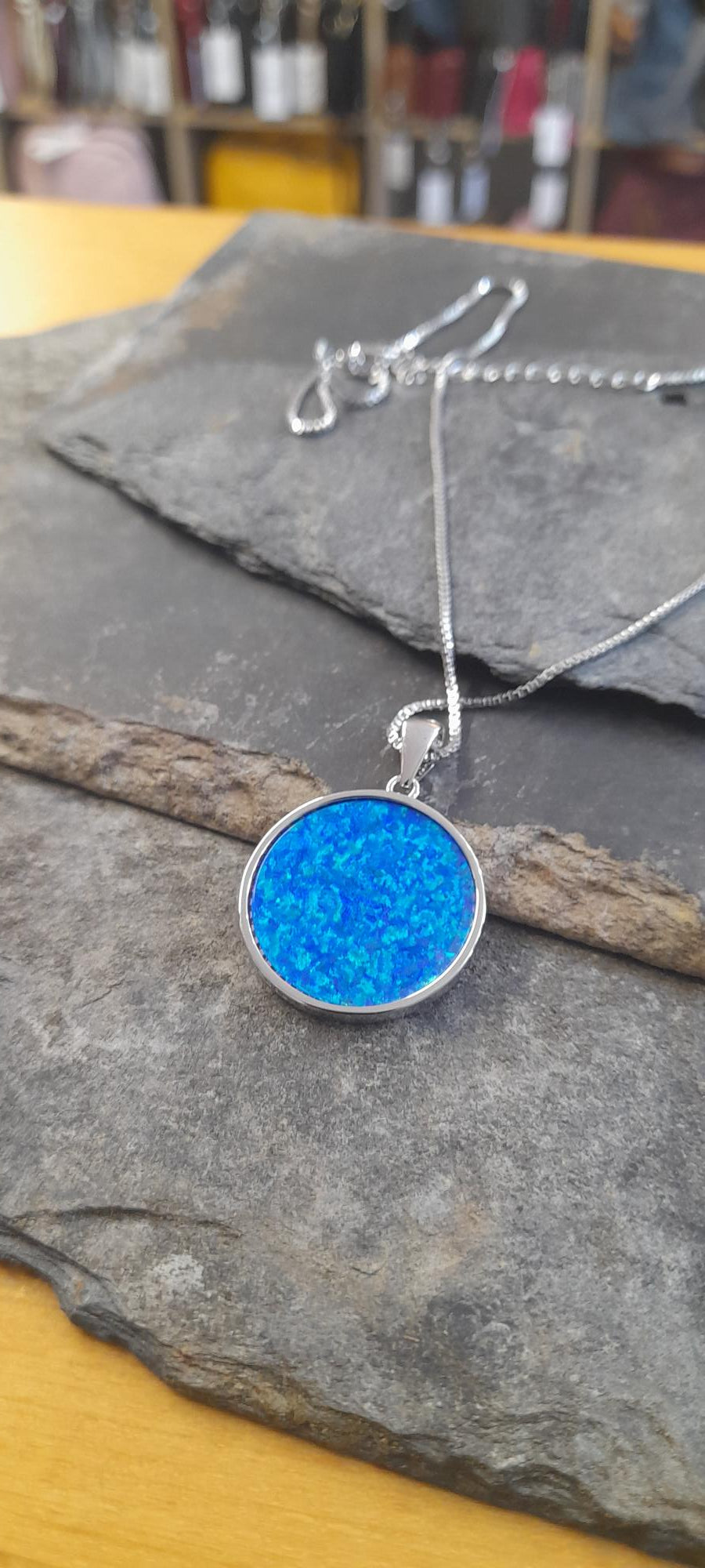 SP520BC - LOTUS FLOWER & CZ S/PLATE SYN/OPAL  22MM