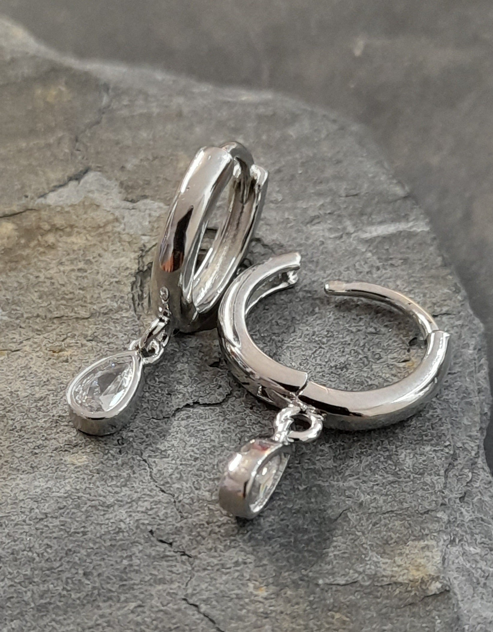 SE571B - 12MM CZ TEARDROP HOOP SILVER PLATE ER